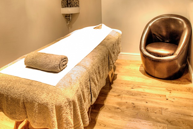 Massage session in a modern spa setting
